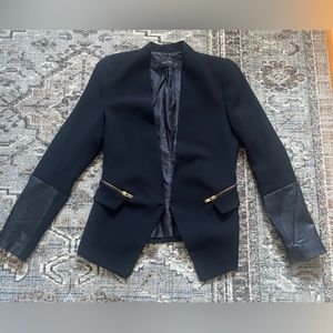 Structured Zara blazer with gold zippers and leather sleeves